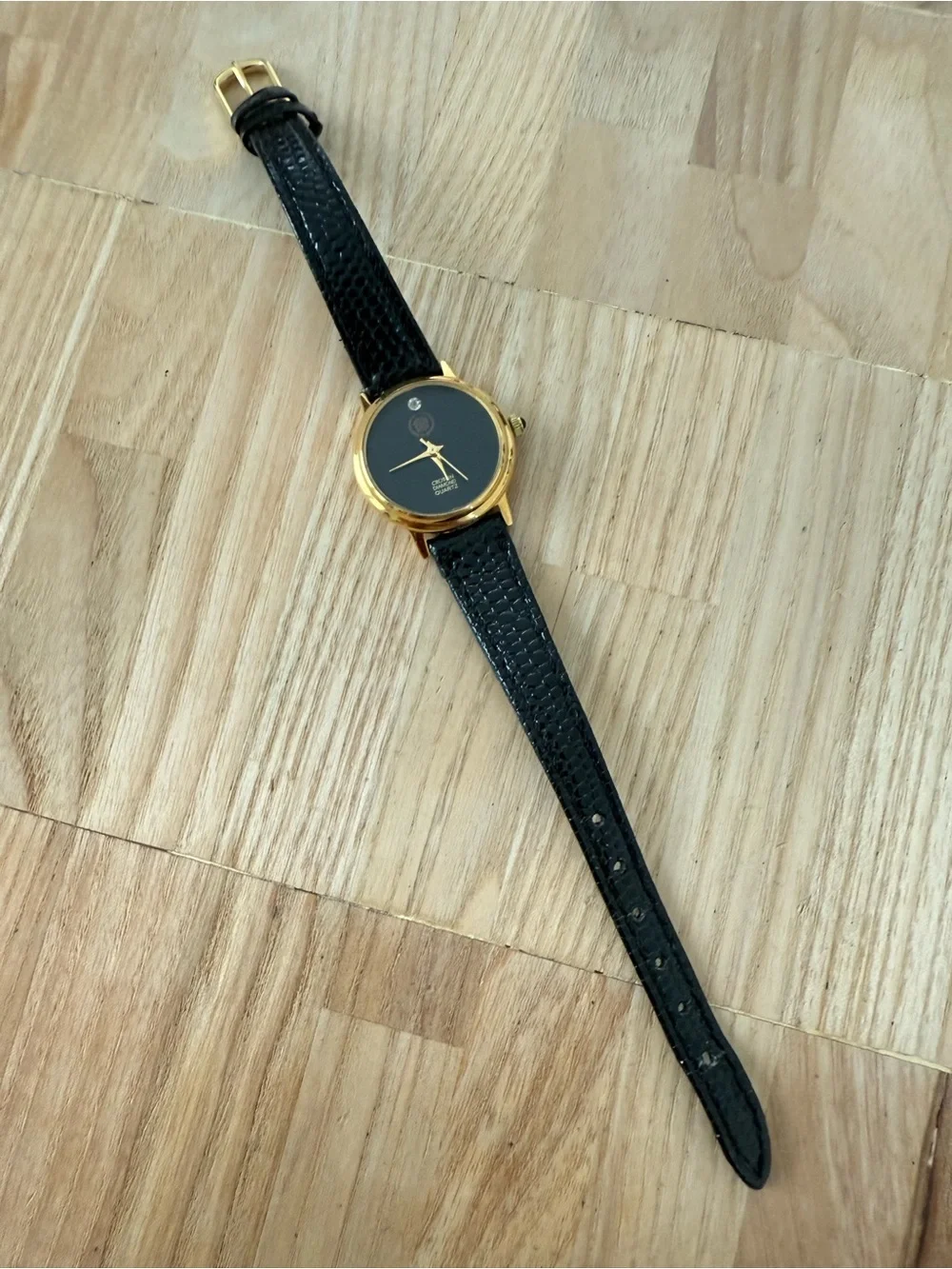 Reliance by croton diamond ladies black and gold tone watch NEW BATTERY